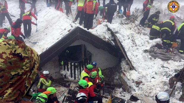 At least 14 people are dead and 15 still missing after an avalanche at a hotel near the helicopter crash site last week. (AAP)