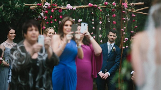 Wedding photographer Thomas Stewart is sick and tired of wedding guests using their phones and iPads during the ceremony. (Thomas Stewart Photography)