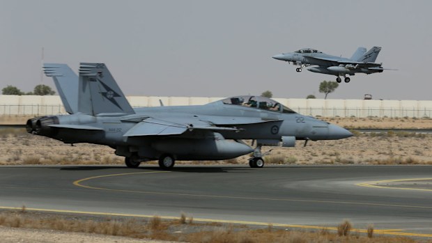 <b>Photos from Australia's military operation in Iraq:</b> The two Super Hornets departing Australia's main base in the Middle East to conduct their first combat mission in Iraq last weekend. (Picture: ADF)