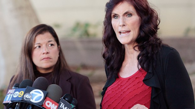 Actress Cindy Lee Garcia (R) and her attorney M. Cris Armenta are attempting to stop the film's broadcast on YouTube. (AAP)