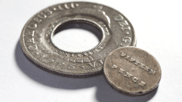 A holey dollar, dating from the time of Governor Lachlan Macquarie, was among the stolen coins. 