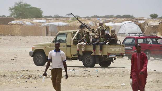 Niger's soldiers patrol near Bosso on June 17, 2016 following attacks by Boko Haram fighters in the region. (AFP)