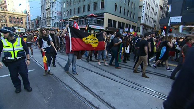 Protesters are marching through the CBD in opposition to the closure of indigenous communities in remote WA. (9NEWS)