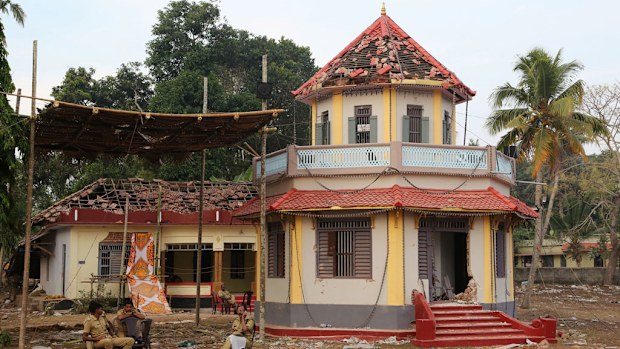 The unauthorised pyrotechnic display swept through a temple packed with thousands during a religious festival. (AP)