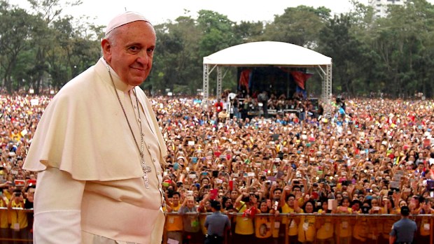 Pope Francis stands before a gathering of millions of devotees. (AAP)