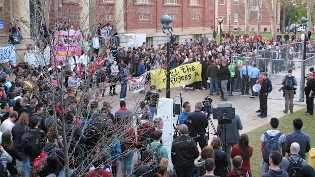 Protesters in Adelaide have rallied in large numbers against the Abbott government. (AAP)