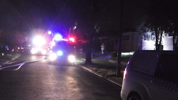 Emergency services outside the Donaldson Street address. (Steven Ledbrook)