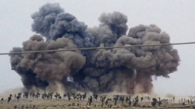 Smoke rises after airstrikes in Kafr Nabel of the Idlib province in Syria.
