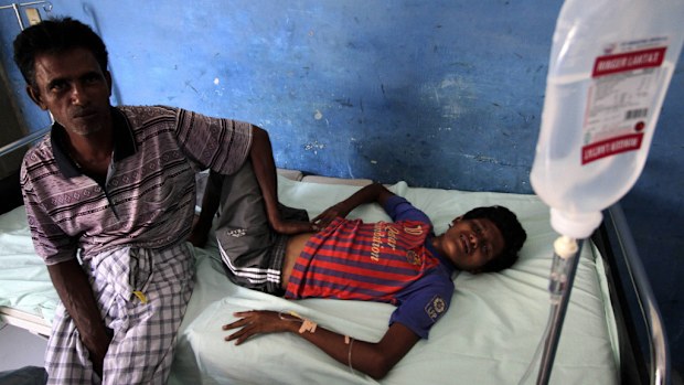 A Rohingya migrant is treated in a North Aceh local hospital after being rescued. (AAP)