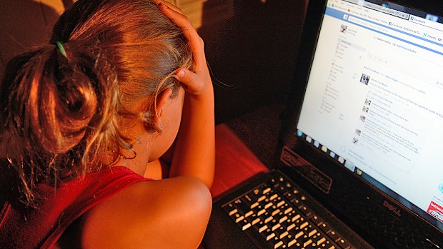 Children can easily and anonymously report online predators. (AAP)
