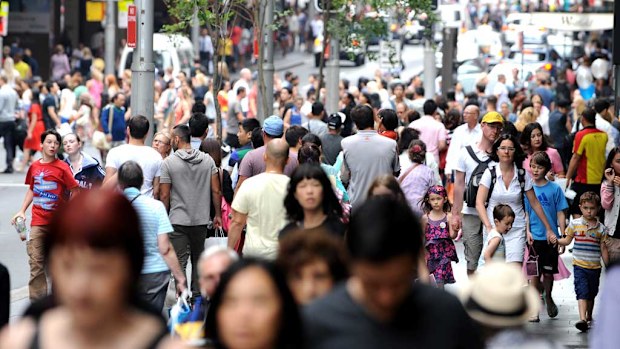 Shoppers in Market Street, Sydney, get in some last minute shopping before Christmas last year. (AAP)