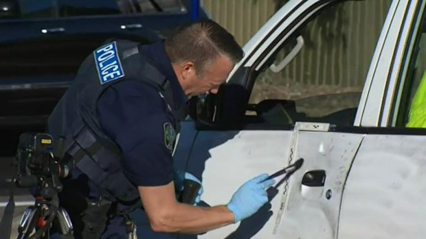 Forensic officer remain at the scene of the assault. (9NEWS)