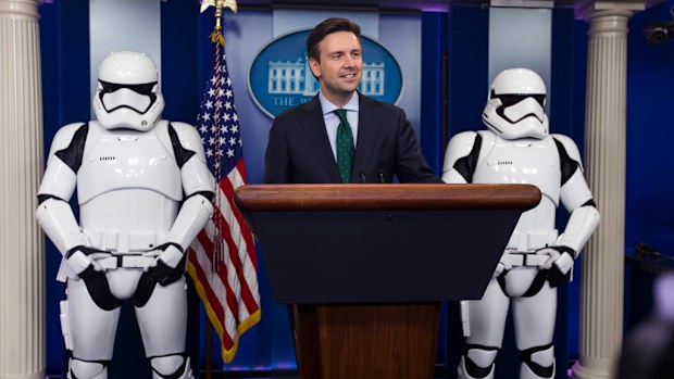 White House press secretary Josh Earnest flanked by Storm Troppers. (AAP)