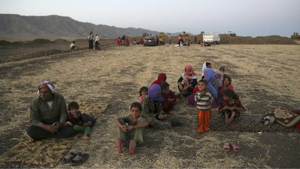 Members of the minority Yazidi community have had to flee Islamic State militants in fear of genocide. (AAP)