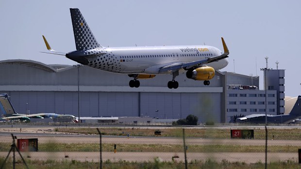 A Vueling plane lands. (AFP)