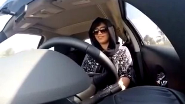 This file image made from video released by Loujain al-Hathloul, shows her driving towards the United Arab Emirates - Saudi Arabia border before her arrest. (AAP)