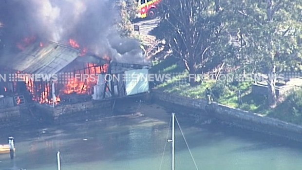 The fire destroyed much of a boat shed at Bedlam Bay. (9NEWS)
