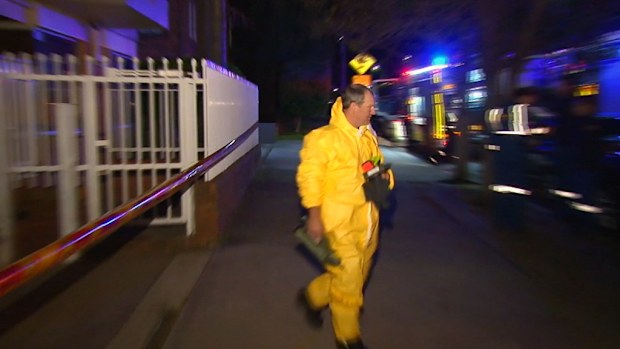 HAZMAT crews are working to determine what the white powder is. (9NEWS)