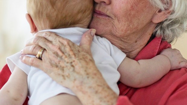 Grandmother holding baby