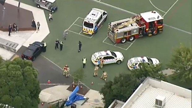 The car crashed through the fence at the school in Brighton east. (9NEWS)