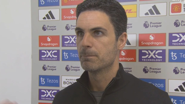 Arsenal manager Mikela Arteta walks out of post-match interview.