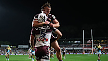 Blake Wilson of the Sea Eagles celebrates scoring a try with Josh Feledy of the Sea Eagles.