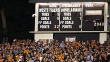 Fans watch on during the round three NRL match between Wests Tigers and Cronulla Sharks at Leichhardt Oval. (Photo by Jeremy Ng/Getty Images)