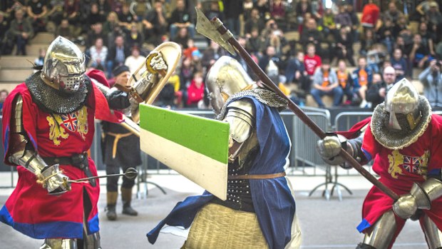 Fighters from UK team Battle Heritage Lions take on a combatant from SG Munich in the Rise of the Knights III tournament in Bernau, Germany. (Getty)