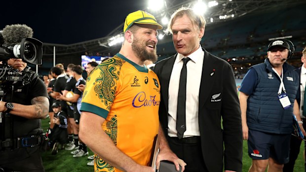 James Slipper of the Wallabies is congratulated by Scott Robertson.