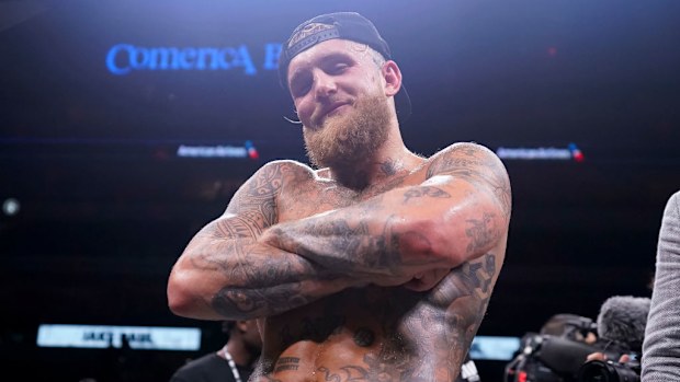 Jake Paul poses for a photo after defeating Nate Diaz.