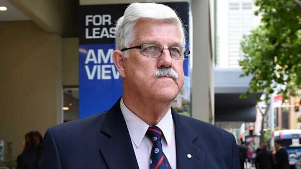 Former commander of the Child Protection Enforcement Agency John Heslop at the commission today. (Getty)