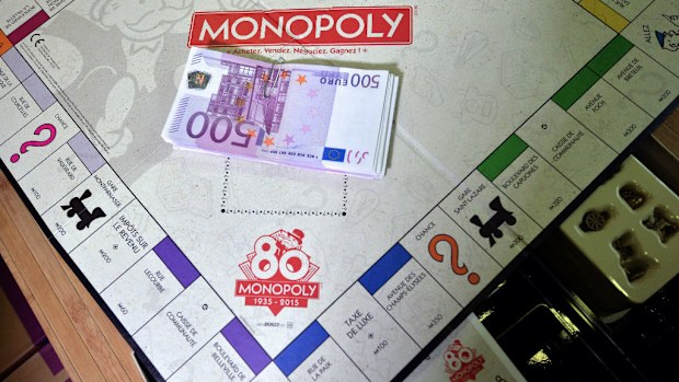 Hasbro is putting real money into its Monopoly sets as part of its 80th anniversary celebration. (Getty)