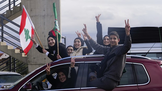 Displaced residents celebrate as they return to their villages following a ceasefire between Israel and Hezbollah that went into effect on Wednesday, Nov. 27, 2024, in Ablah, eastern Lebanon. 