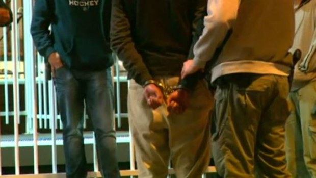 A man was arrested following the alleged assault and robbery of two elderly men in Lidcombe.