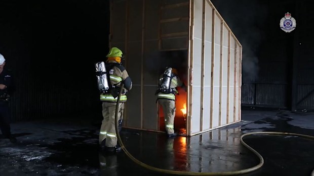 Queensland police re-enact a fire for clues about the attempted murder of several Morayfield children. (QPS)