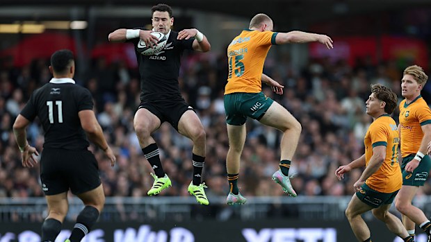 Will Jordan of New Zealand collects the ball.