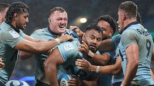 Taniela Tupou of the Waratahs celebrates scoring his team's third try.
