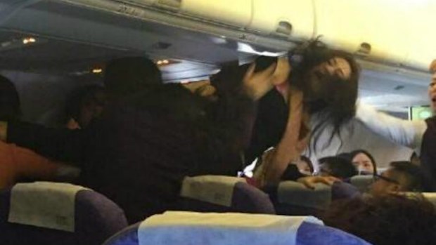 A fight between four people broke out on an Air Asia flight to Hong Kong. (Supplied)