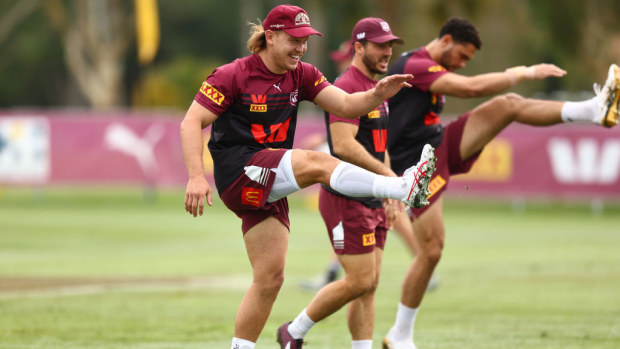 Reuben Cotter warming up in the Maroons camp.