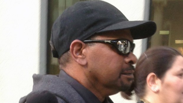 Patrick Alfred Dennis Comeagain leaves Perth magistrates Court, Perth on July 24, 2014. (AAP Image/Angie Raphael)