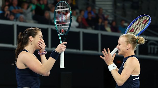 Harriet Dart and Jodie Anna Burrage of Great Britain celebrate winning.