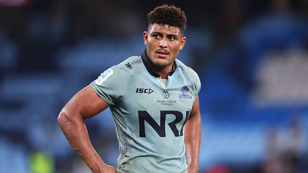 Miles Amatosero of the Waratahs looks dejected after defeat.