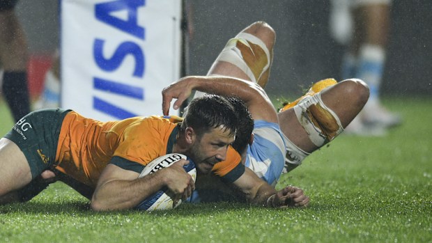 Australia's Jake Gordon scores a try in La Plata.