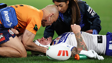 SYDNEY, AUSTRALIA - JULY 08: Ryan Sutton of the Bulldogs receives attention after injuring himself in a tackle during the round 19 NRL match between South Sydney Rabbitohs and Canterbury Bulldogs at Accor Stadium on July 08, 2023 in Sydney, Australia. (Photo by Cameron Spencer/Getty Images)