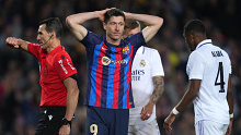 Robert Lewandowski reacts during Barcelona's clash with Real Madrid earlier this year. 