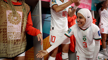 Nouhaila Benzina and Morocco players celebrate after the team's 1-0 victory.