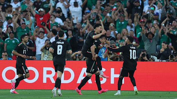 Johan Vasquez of Mexico celebrates scoring.
