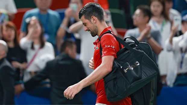 Novak Djokovic of Serbia leaves the court.