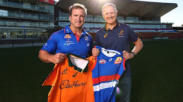 Luke Beveridge poses with Joe Schmidt at Mission Whitten Oval.