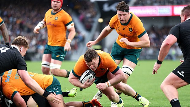 Billy Pollard of Australia dives towards the tryline to score.